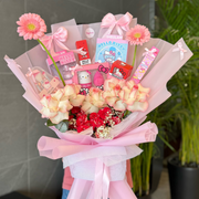 Hello Kitty MakeUp Bouquet of flowers with Hello Kitty-themed products wrapped in pink paper.