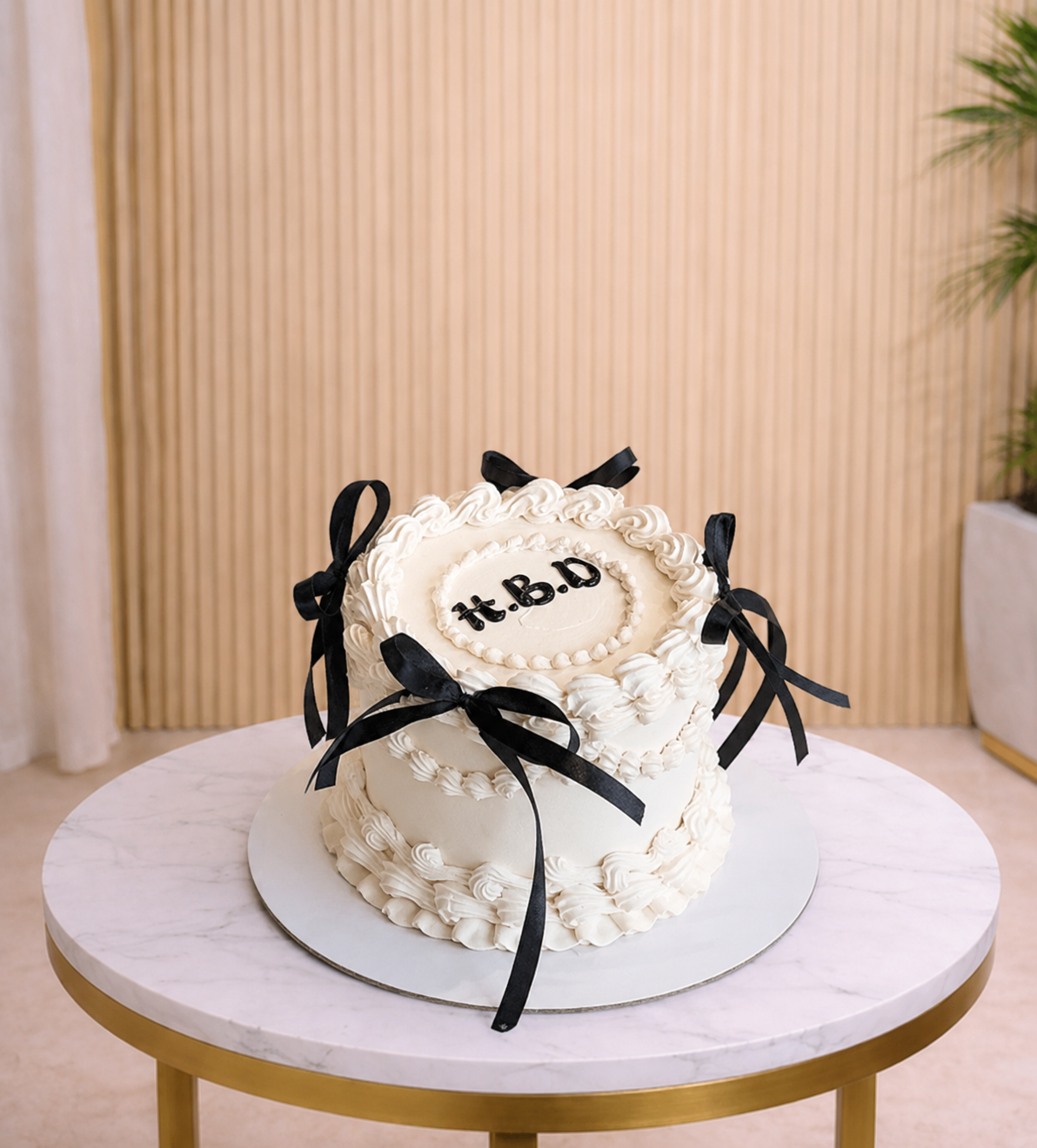Elegant White Vanella Cake with Black Ribbon same day cake delivery Dubai