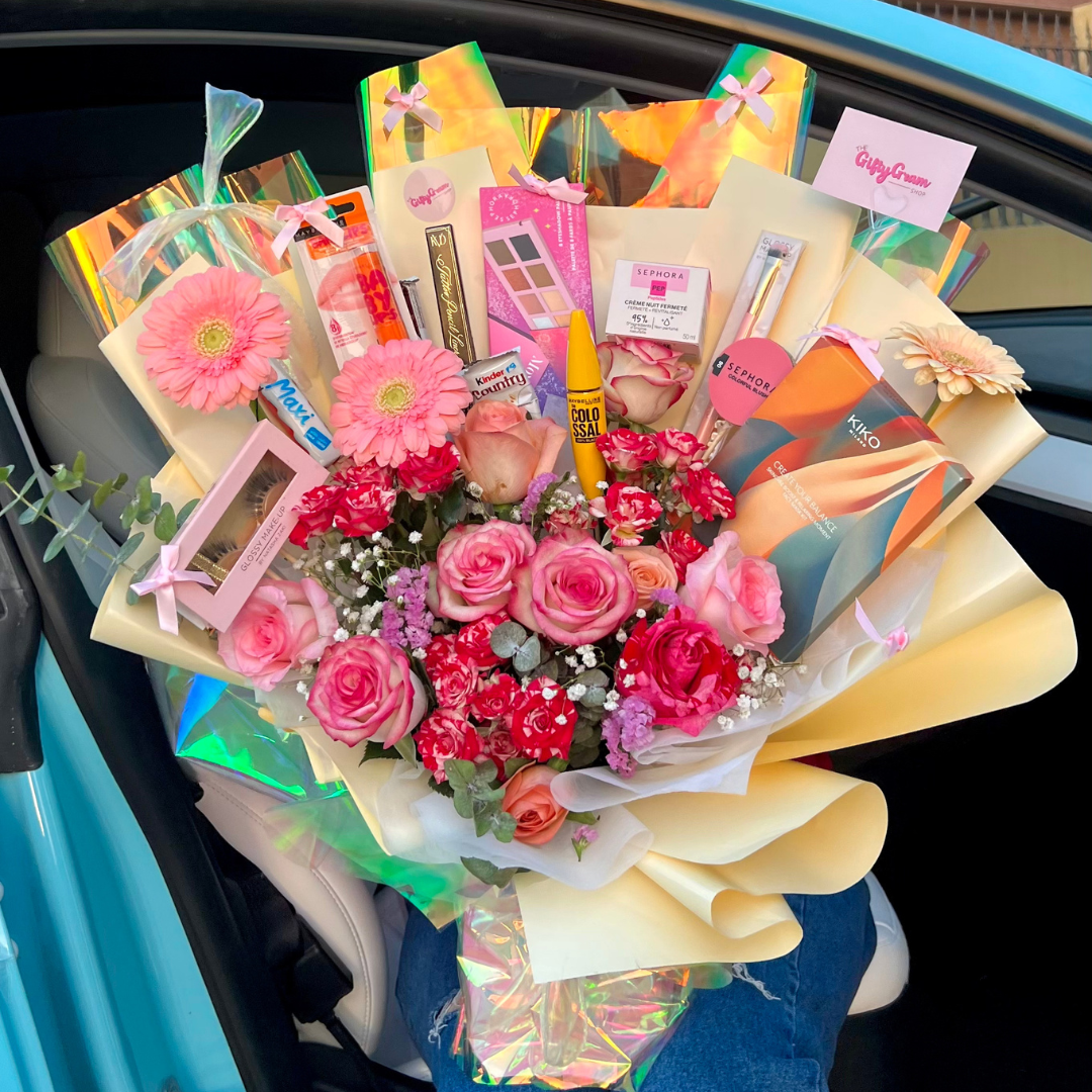 Premium MakeUp Bouquet with flowers and beauty products inside a car
